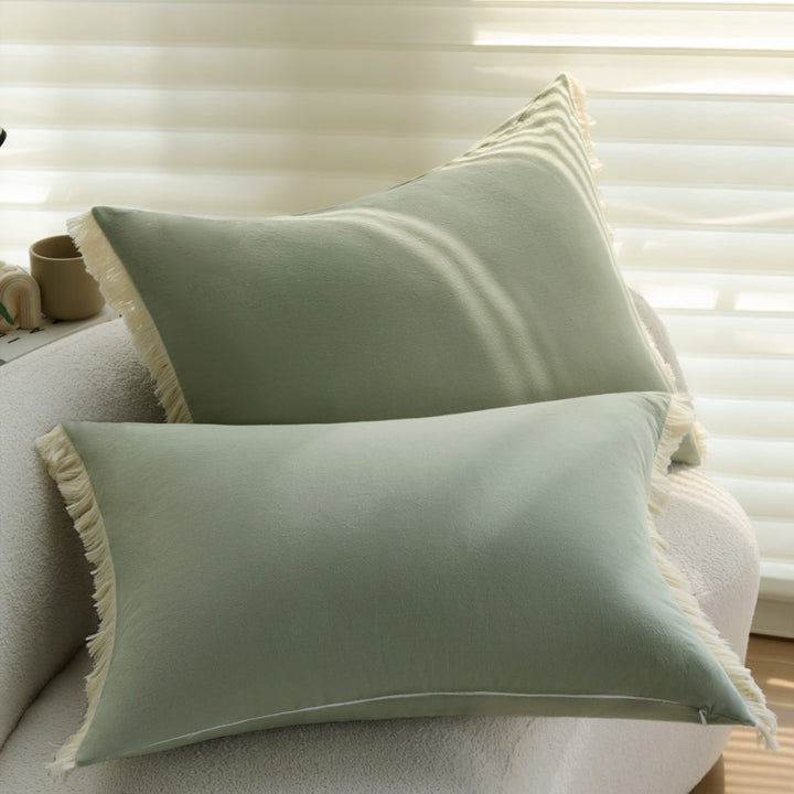 Rectangular decorative cushion cover with subtle fringes and soft cotton-linen look Bowlift
