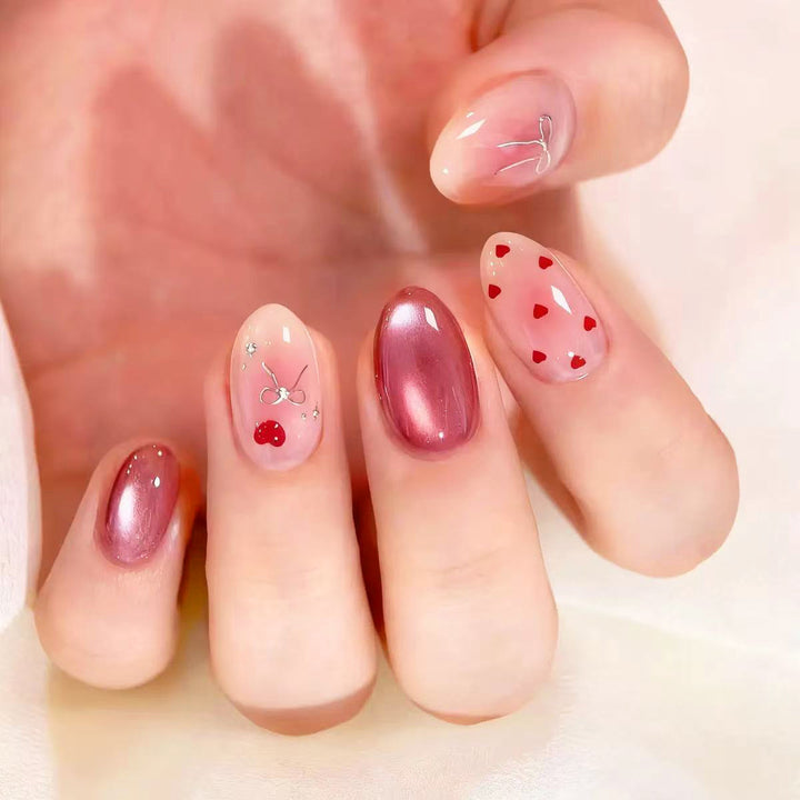 Nail art set with romantic hearts and elegant bows Bowlift