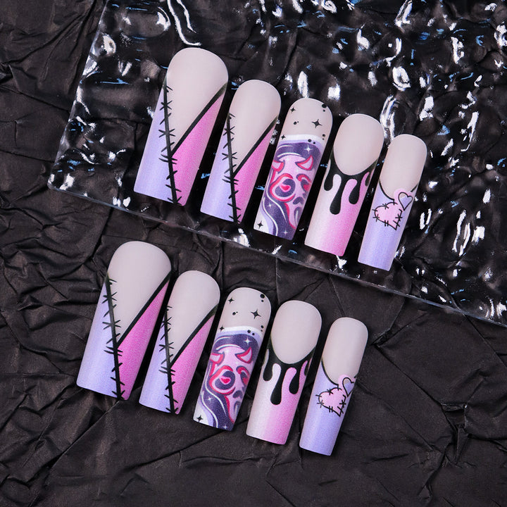 Artistic Stiletto Press-On Nails with Unique Graphic Design Bowlift