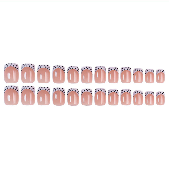 Artificial nail set with elegant dots and high-gloss accents Bowlift