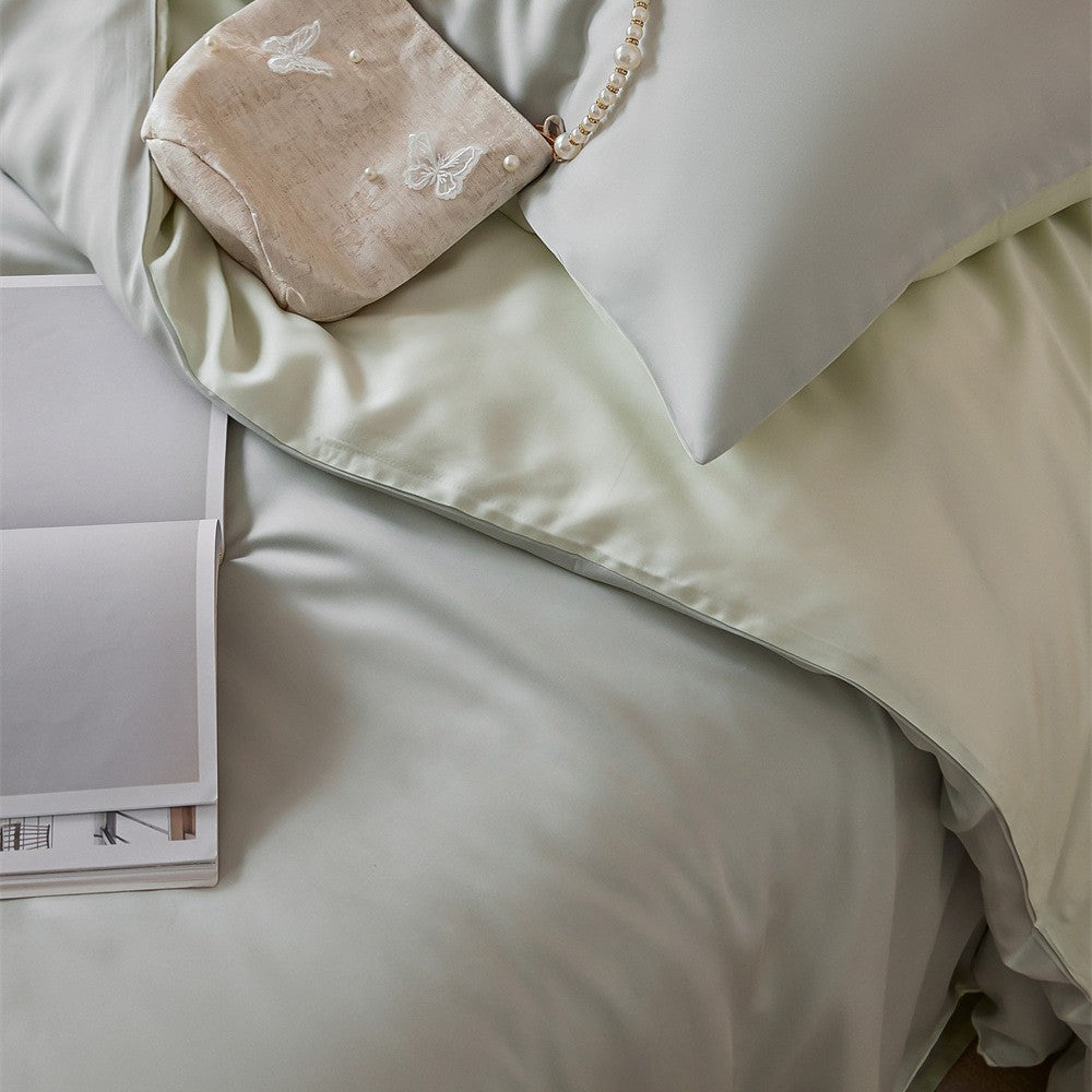 Luxurious cotton satin bedding set with a silky-matte feel, reversible function, and fine piping