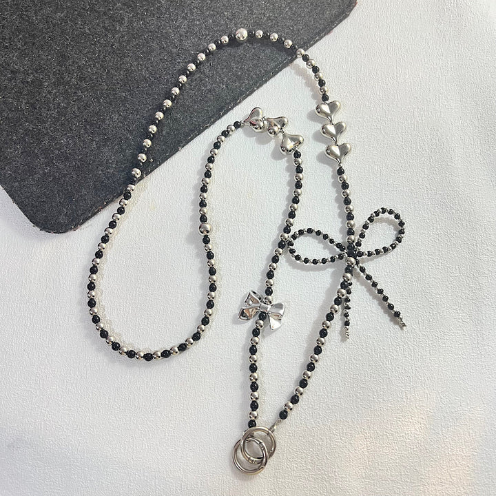 Elegant Pearled Charm Necklace Bowlift