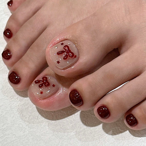 Artificial nails with decorative bows and stars Bowlift