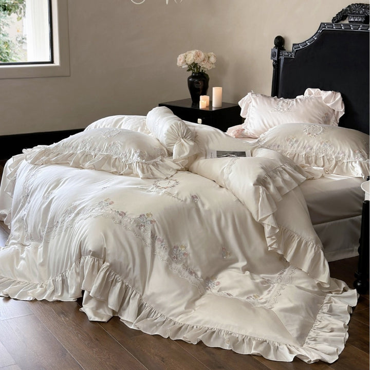 Romantic satin bedding set with ruffles, embroidered flowers, and flounce