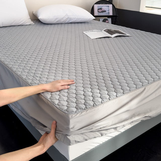 Quilted mattress protector with elastic all around and waterproof breathable protective cover