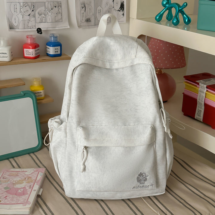Versatile Lightweight Backpack with Decorative Accents Bowlift