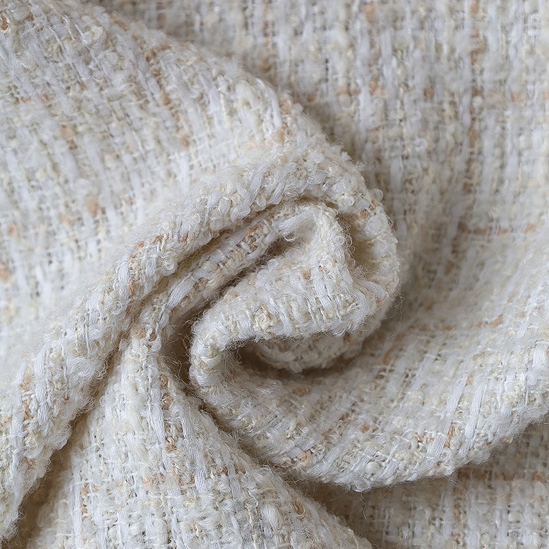 Square cushion cover made of textured bouclé blend with decorative piped seam Bowlift