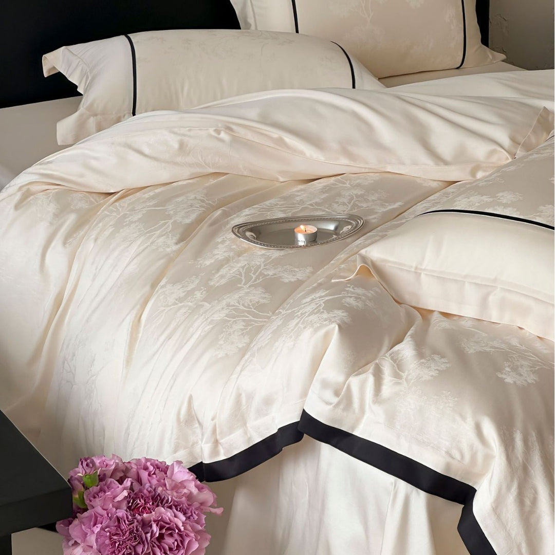 Luxurious jacquard bedding set with subtle tree relief and contrasting piping