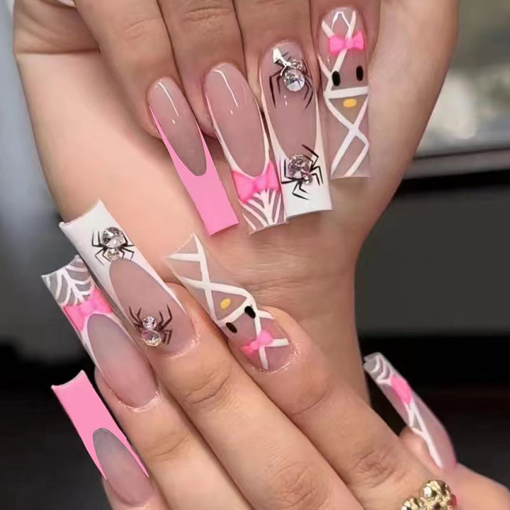 Artistic Press-On Nail Extensions with Spider and Bow Design Bowlift