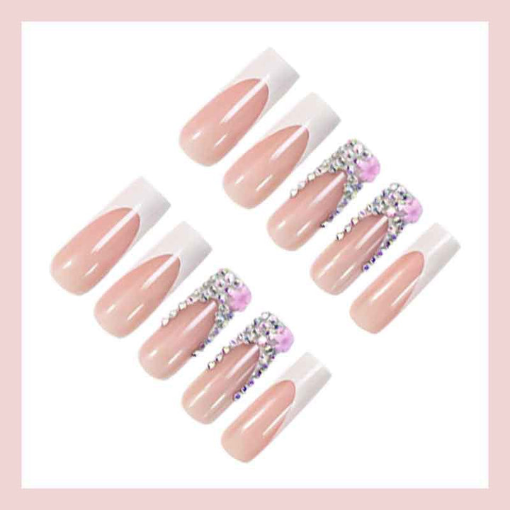 Art nail set with elegant glitter and floral accents Bowlift