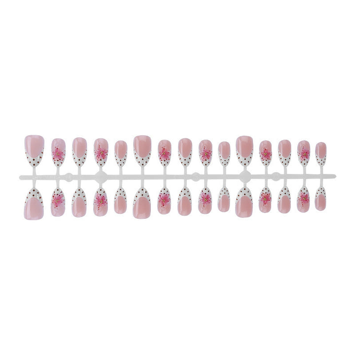 Artificial nail set with floral accents Bowlift