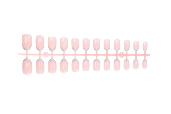 Acrylic nail set with elegant French tip and glitter accents Bowlift