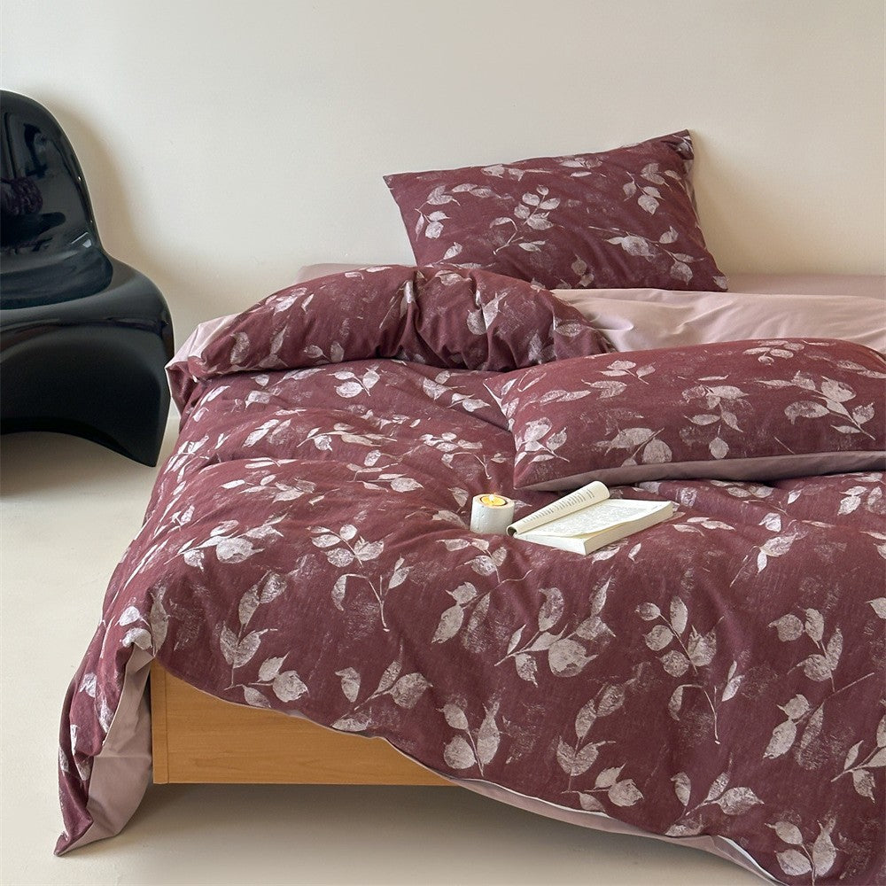 Bedding set made of washed cotton satin with a textured houndstooth pattern and reversible function