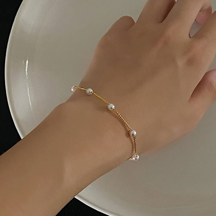 Elegant Pearl Accent Chain Bracelet Bowlift