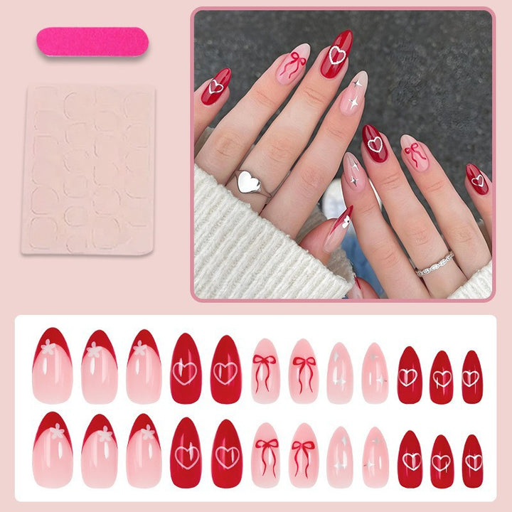 Artificial nail set with romantic hearts and bows Bowlift