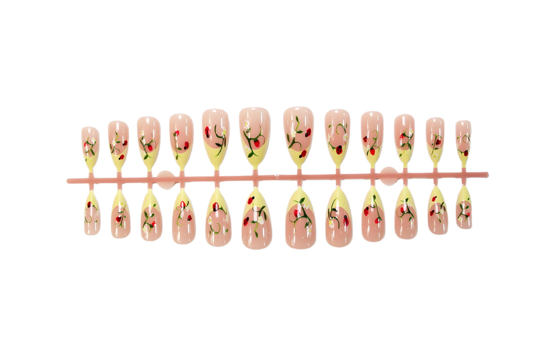 Artificial nail set with elegant gradient and floral accents Bowlift