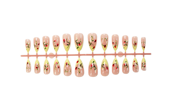 Artificial nail set with elegant gradient and floral accents Bowlift