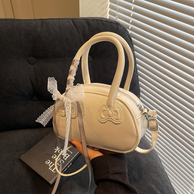 Elegant Bow-Detail Handheld Satchel Bowlift