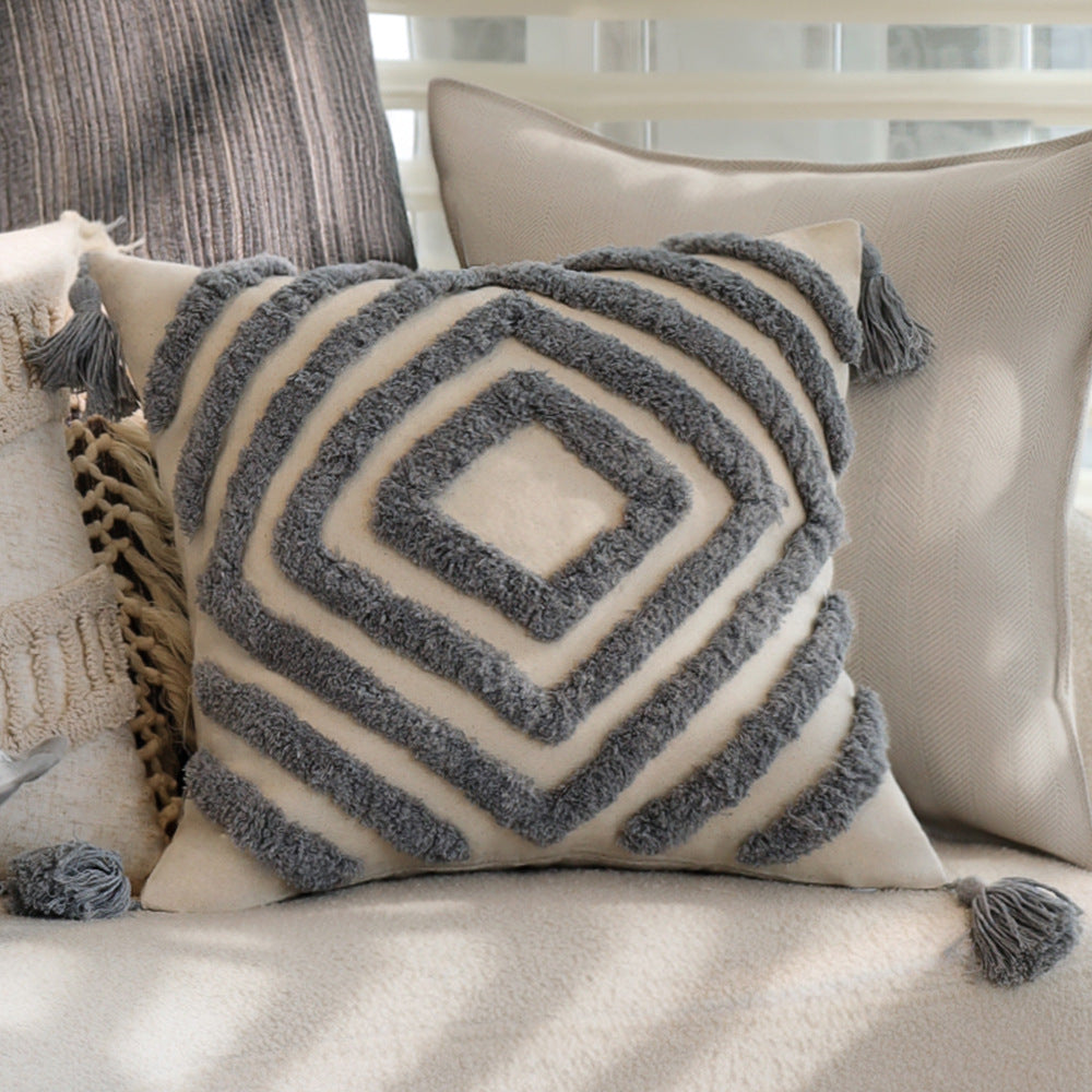 Rectangular linen look lumbar pillowcase with fine striped texture and tassels Bowlift
