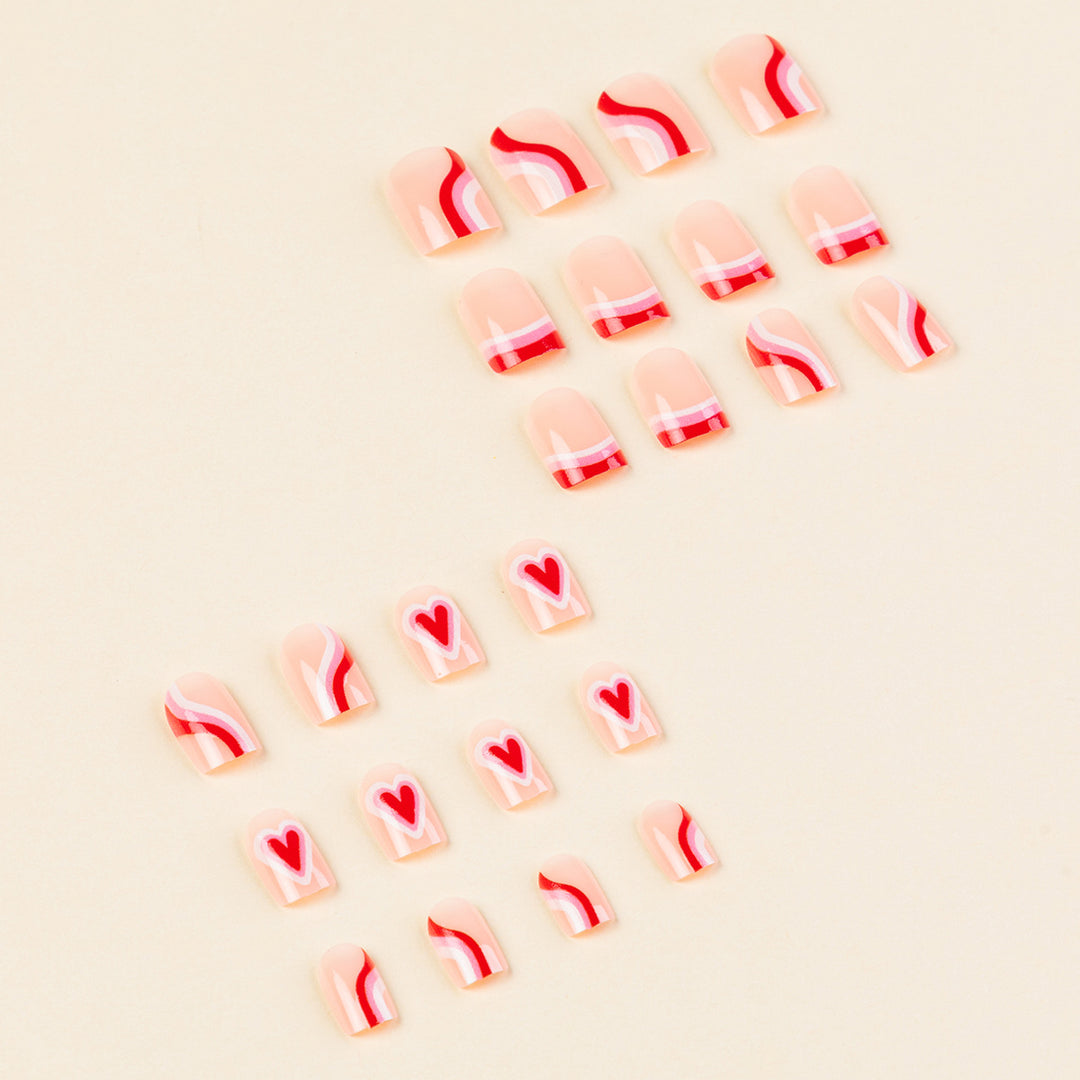 Artistic Heart-Themed Nail Art Extensions