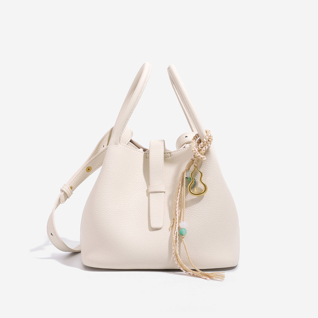 Stylish Bucket Handbag with Decorative Charm