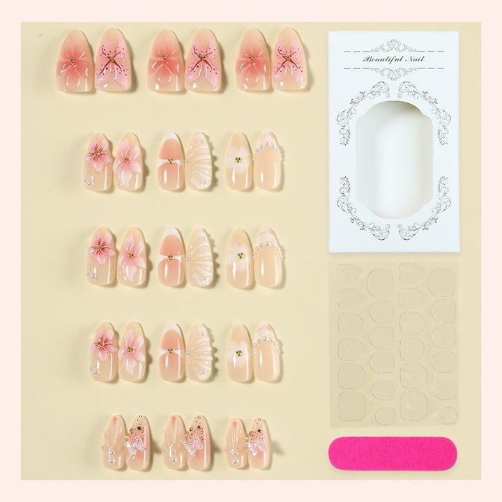 Art nail set with delicate flower and jewelry details Bowlift
