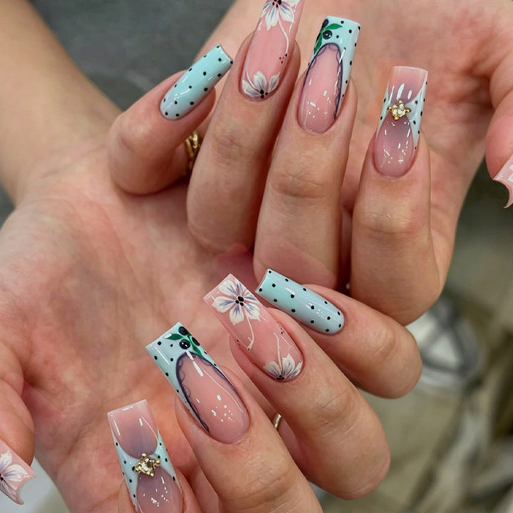 Artificial nail set with floral designs Bowlift