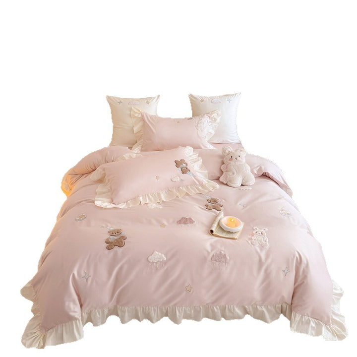 Romantic ruffle bedding set with embroidered teddy bear and cloud appliqués