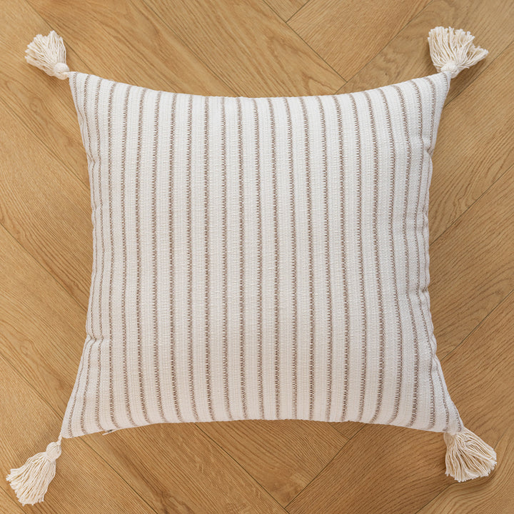 Cozy textured cushion with fringes