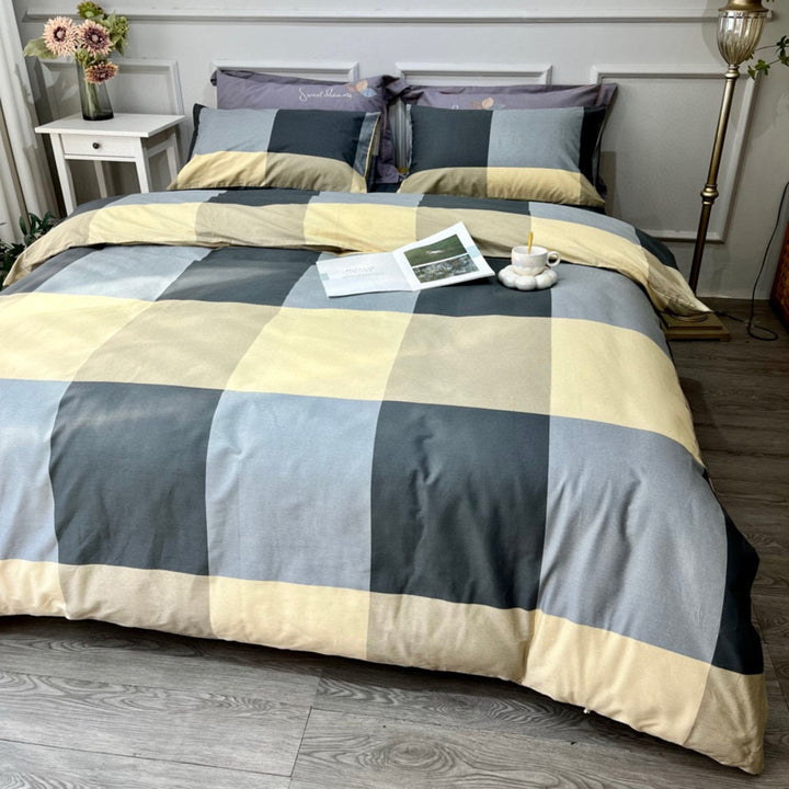 Bedding set made of cotton blend with botanical leaf pattern and reversible solid color back
