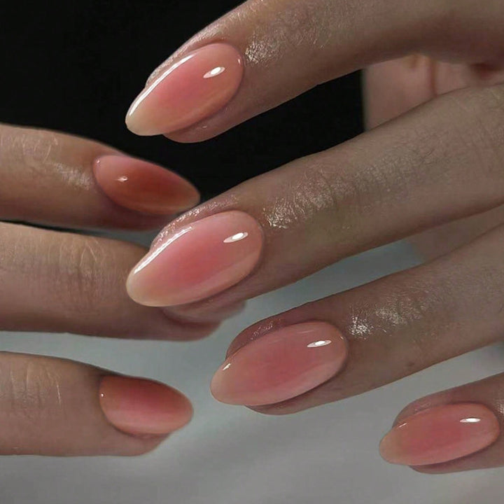Acrylic nail set with elegant nude ombre effects Bowlift