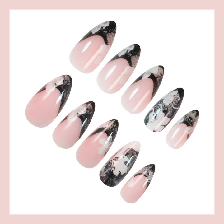 Artificial nail set with elegant tips and floral decorations Bowlift