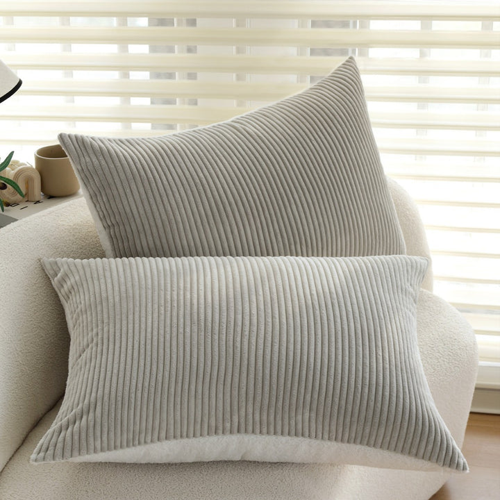 Rectangular corduroy cushion cover with a fine ribbed structure and teddy inner side Bowlift