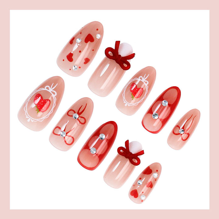 Artificial nail set with cute heart and bow designs Bowlift