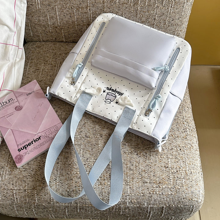 Stylish Dot-Printed Backpack with Decorative Accents Bowlift