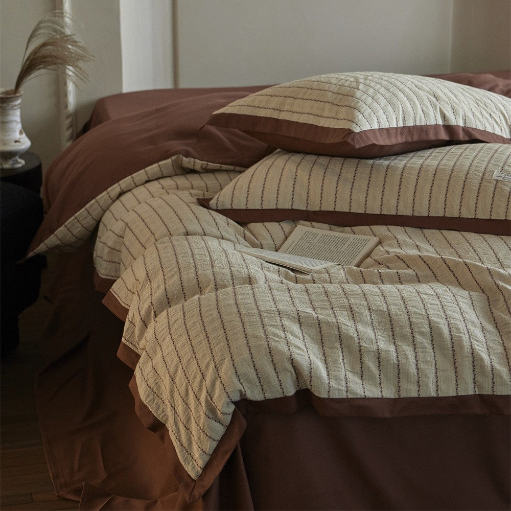 Luxurious cotton bedding set with ruffled trim and pillowcases