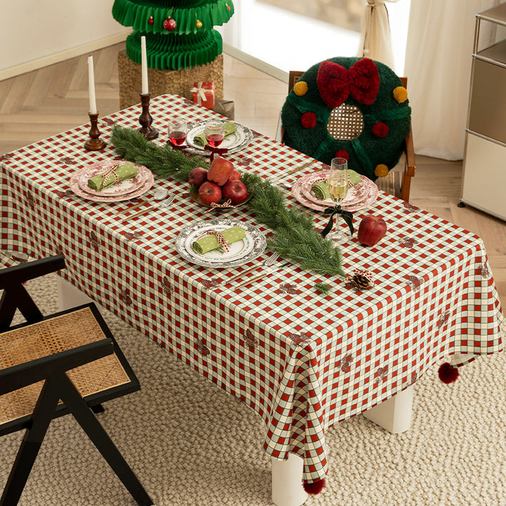 Rectangular decorative tablecloth with checkered pattern, pompom trim, and fine embroidered applique Bowlift