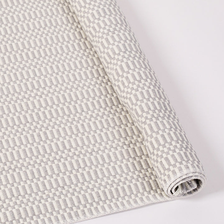 Flat-woven cotton rug runner with geometric check pattern and easy-care surface Bowlift