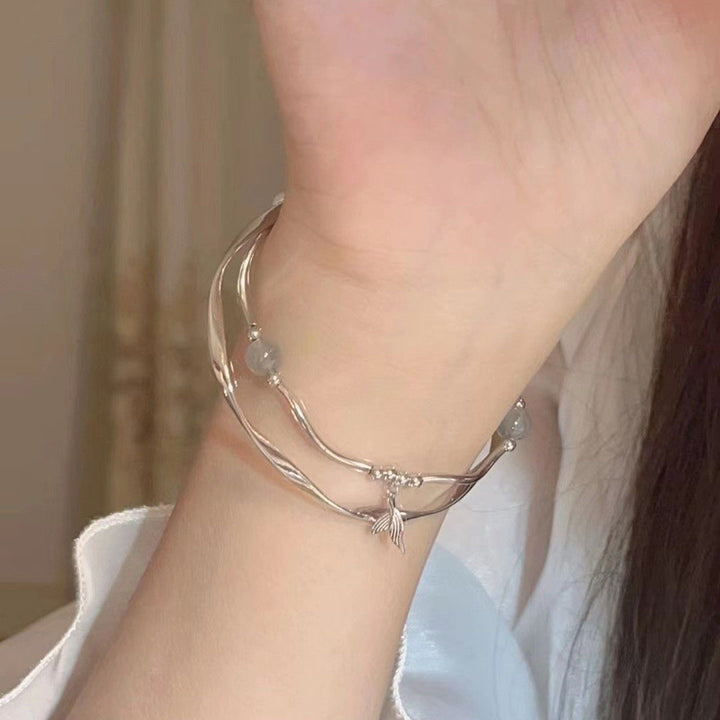 Elegant Silver Fish Charm Bracelet Bowlift
