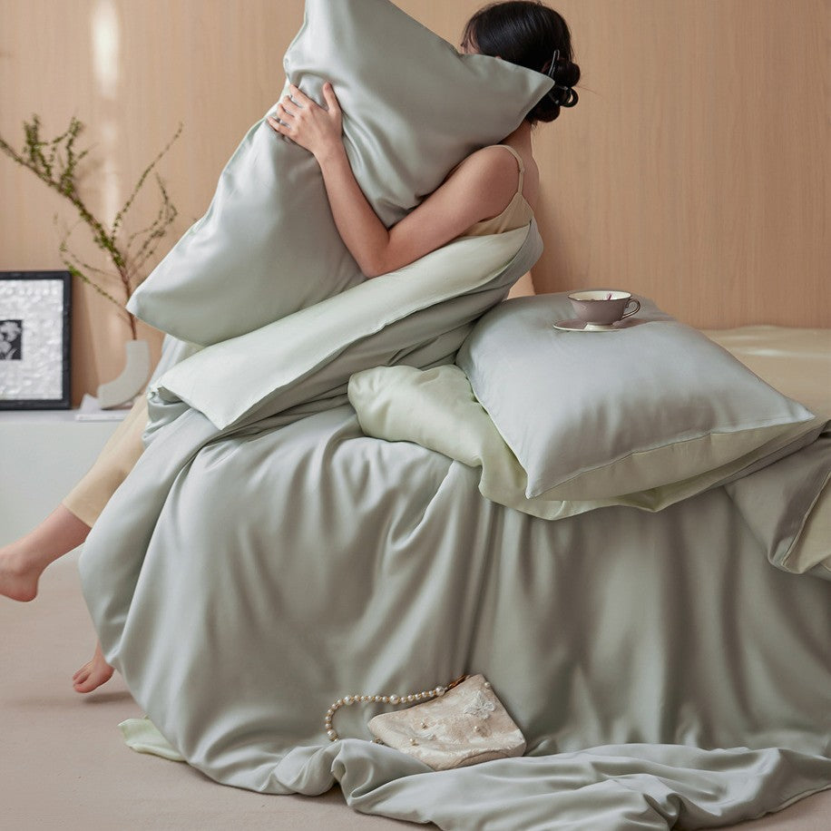 Luxurious cotton satin bedding set with a silky-matte feel, reversible function, and fine piping