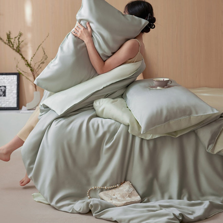 Luxurious cotton satin bedding set with a silky-matte feel, reversible function, and fine piping