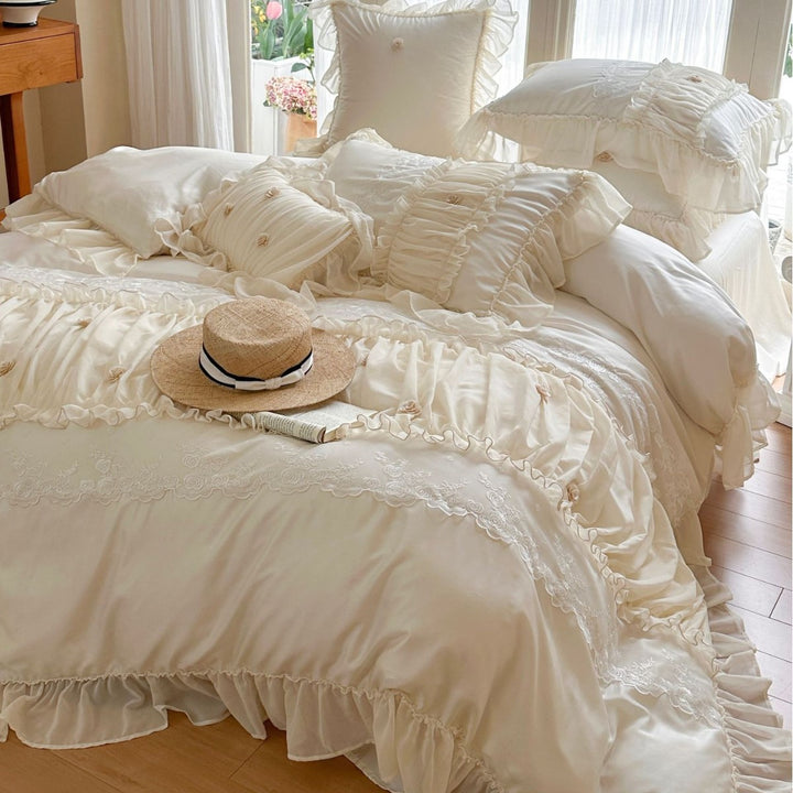 Romantic duvet cover set with ruffles, lace trim and rose appliqués