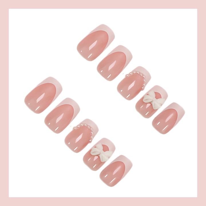 Artifice nail set with elegant flower and pearl decorations Bowlift