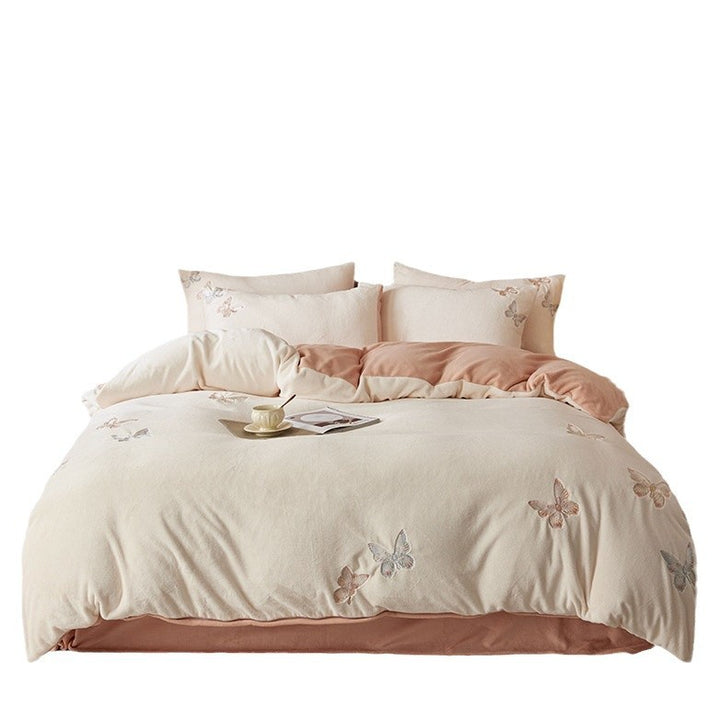 Reversible bedding set made of microfleece with embroidered butterflies