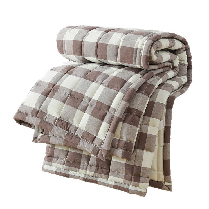 Padded quilted mattress topper with microfiber cover and non-slip bottom