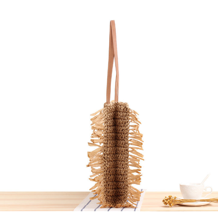 Beach bag with fringes and sturdy leather handles Bowlift