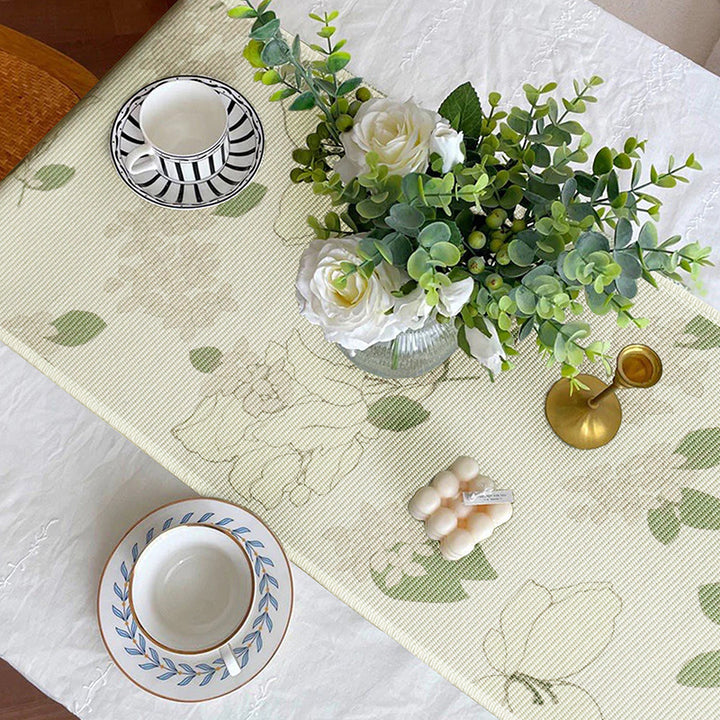 Woven table runner with floral jacquard pattern and fringed edge Bowlift