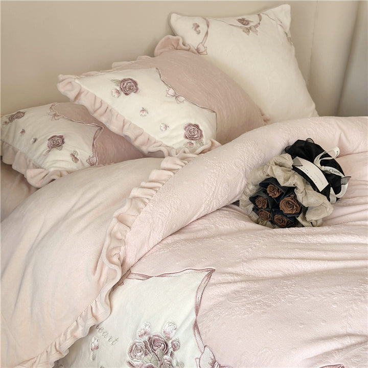 Romantic embroidered bedding set with ruffles and rose motifs