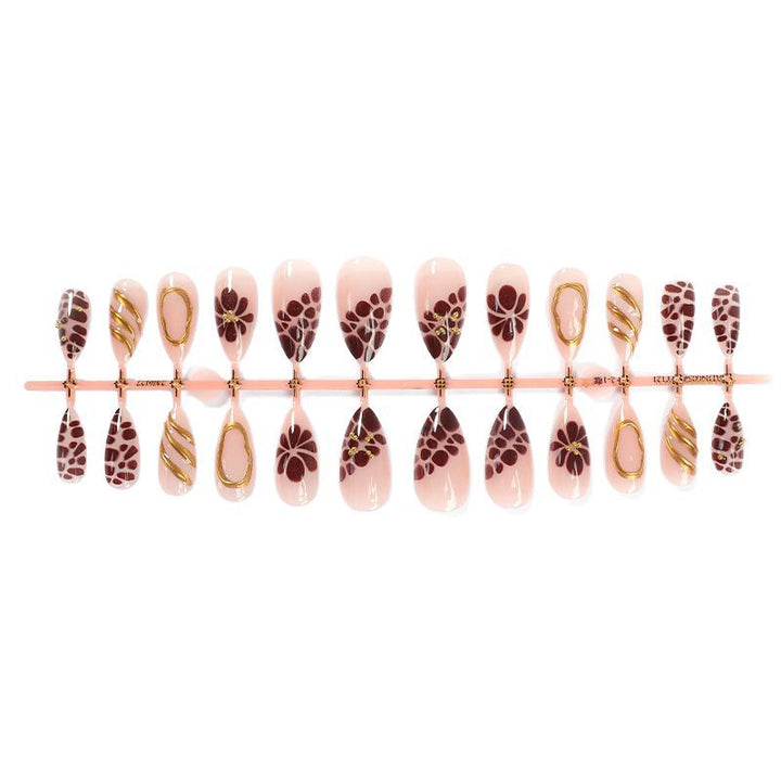 Artificial nail set with elegant flower and gold accents Bowlift