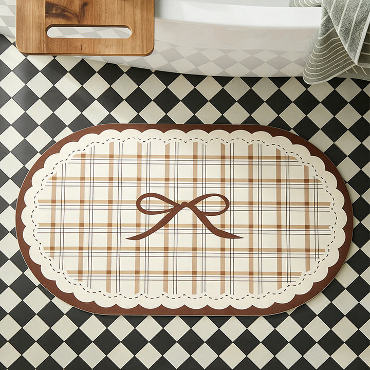 Rectangular wipeable placemat with checked pattern, wavy decorative edge and bow motif Bowlift